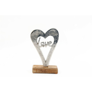 Coeur d'amour en métal argenté sur un socle en bois petit